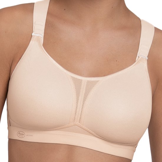 Nude sportbh met verstelbare bandjes, mesh panels op de cups en Anita Active logo.