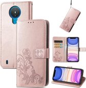 Voor Nokia 1.4 Vierbladige Gesp Reliëfgesp Mobiele Telefoon Bescherming Lederen Case met Lanyard & Kaartsleuf & Portemonnee & Beugel Functie (Rose Goud)