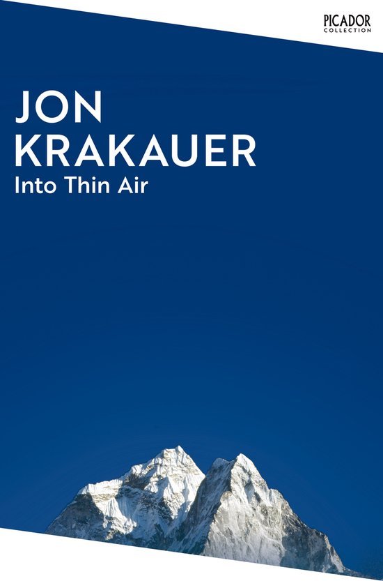 Boekomslag voor 'Into Thin Air' van Jon Krakauer, met een foto van een besneeuwde bergtop tegen een helderblauwe lucht.