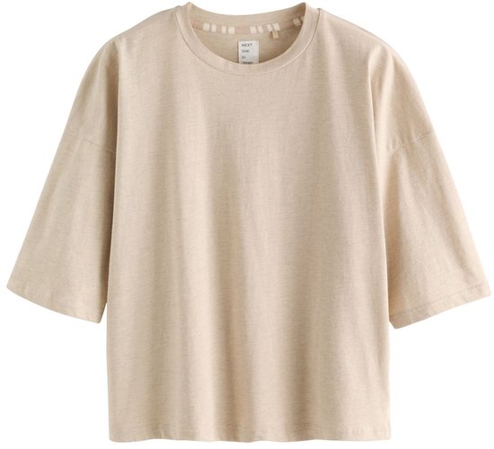 Beige oversized T-shirt met wijde mouwen.