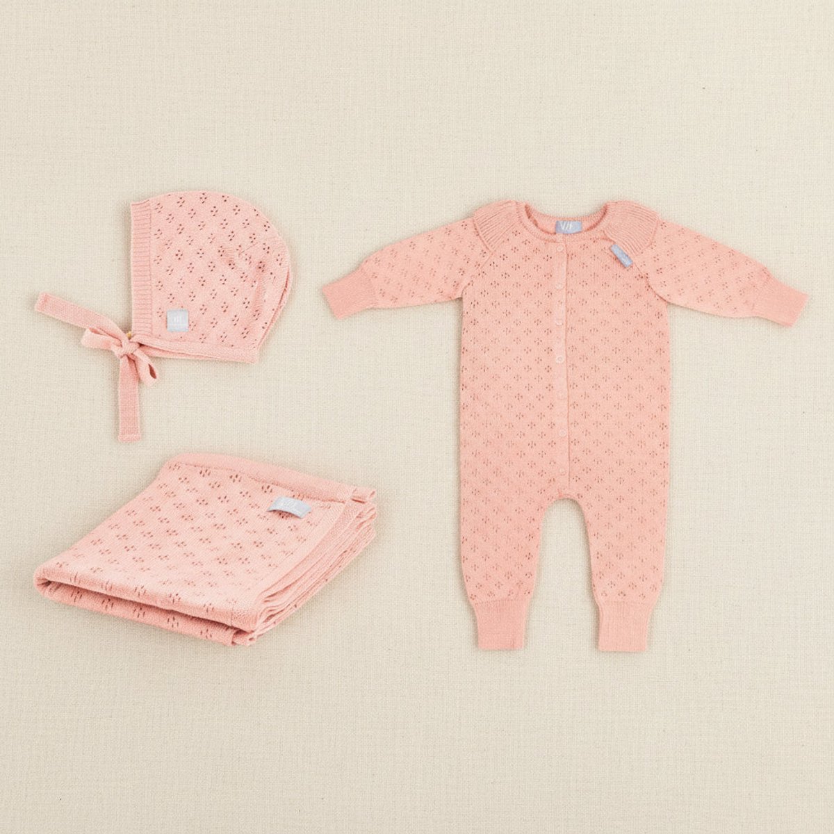 Babygeschenkset van merino wol met bloemenprint - Deken, romper en mutsje - roze - 0-3 maanden