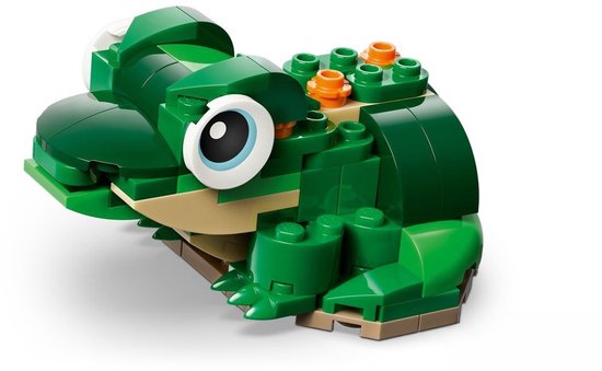Een groene legokikker met grote blauwe ogen, zittend op een licht beige onderstel en met oranje details.