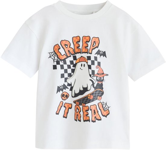 Wit T-shirt met een illustratie van een spook op een skateboard en de tekst 'CREEP IT REAL'.