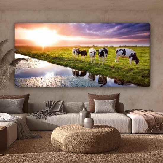 Tableau sur toile Vaches pendant un coucher de soleil - 160x80 cm - Décoration murale Art