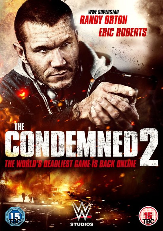 De cover van "The Condemned 2" toont Randy Orton met een wapen. Vuur en explosies op de achtergrond. "THE CONDEMNED 2" staat groot in beeld.