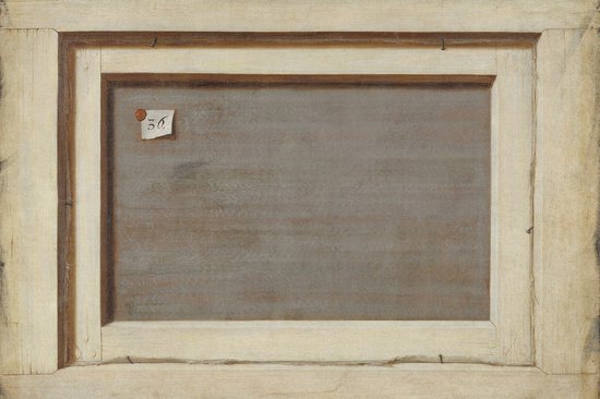 Le dos d'une peinture avec un cadre en bois et une étiquette en papier portant le numéro '36'.