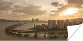 Zon schijnt door de wolken over Busan in Zuid-Korea Poster 160x80 cm - Foto print op Poster (wanddecoratie woonkamer / slaapkamer) / Aziatische steden Poster