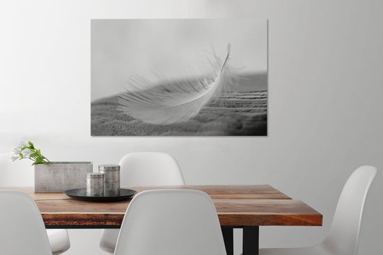 Tableau sur toile Gros plan d'une plume tourbillonnante - 60x40 cm - Décoration murale