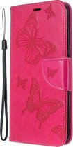 Xiaomi Redmi 8A Hoesje - Mobigear - Butterfly Serie - Kunstlederen Bookcase - Magenta - Hoesje Geschikt Voor Xiaomi Redmi 8A