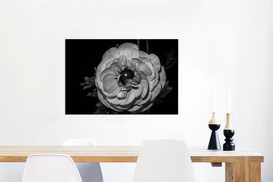 Canvas Schilderij Zwart-witte close-up van een lichte boterbloem - 90x60 cm - Wanddecoratie