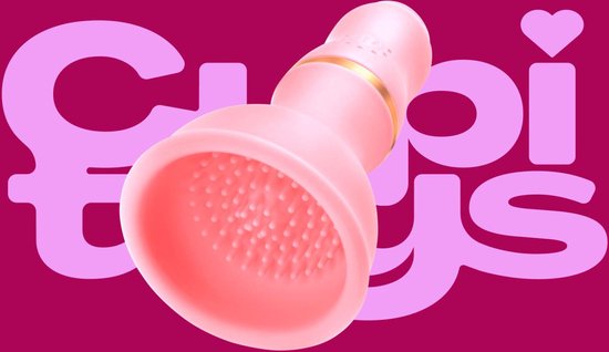 Lichtroze vibrator met gouden ring, borst- en tepelstimulatie.