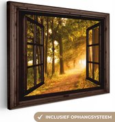 Canvas schilderij 80x60 cm - Wanddecoratie Bos - Bomen - Zonlicht - Herfst - Bospad - Natuur - Doorkijk - Muurdecoratie woonkamer - Slaapkamer decoratie - Kamer accessoires - Schilderijen