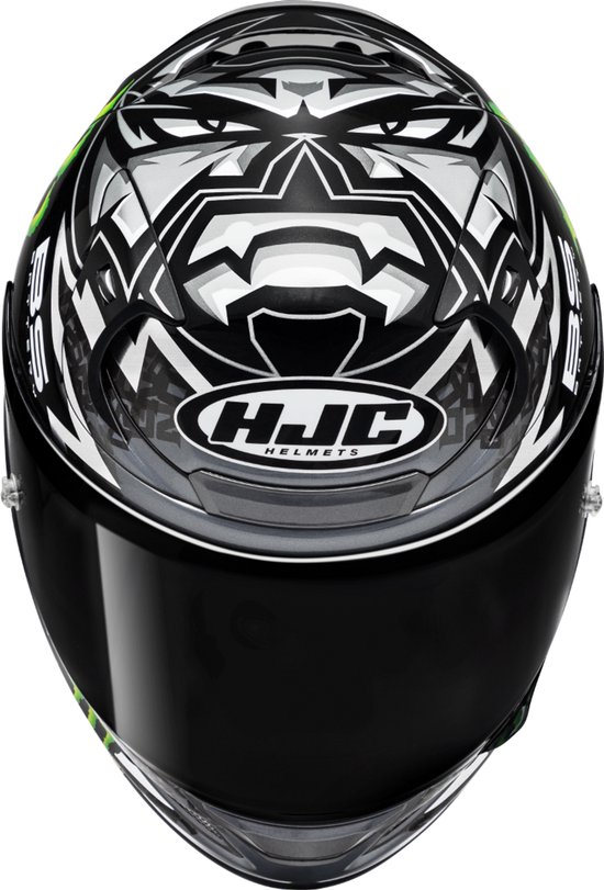 Zwarte HJC integraalhelm, van bovenaf gezien, met witte en groene Monster Energy graphics.