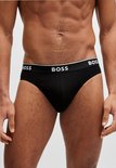 Man draagt zwarte BOSS slip met brede tailleband met logo