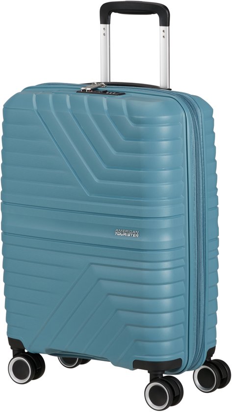 Turquoise koffer met een gestreepte textuur en de American Tourister logo.