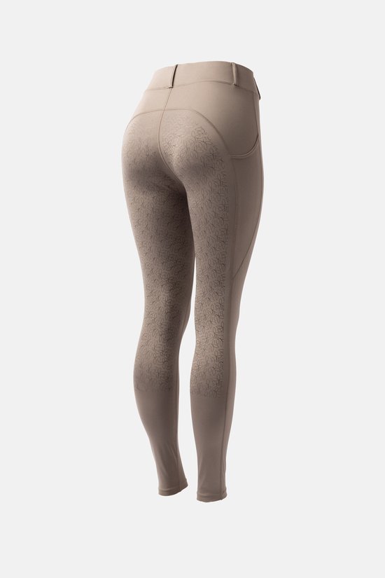 Legging d'équitation marron avec motif grip floral, photographié sur fond gris.