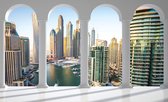 Fotobehang - Vlies Behang - 3D Dubai Stad door de Pilaren gezien - 312 x 219 cm