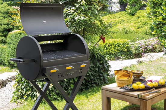 Zwarte Boretti gasbarbecue met open deksel, drie gele knoppen en een x-vormig onderstel.