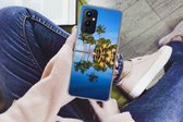 Geschikt voor OnePlus 9 hoesje - Bij Wailea Beach op Hawaii worden palmbomen gereflecteerd op het water - Siliconen Telefoonhoesje