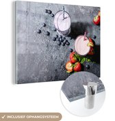 MuchoWow® Glasschilderij 120x90 cm - Schilderij acrylglas - Smoothie - Fruit - Aardbei - Bes - Marmer - Foto op glas - Schilderijen