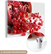 MuchoWow® Glasschilderij 80x60 cm - Schilderij acrylglas - Granaatappel - Zaad - Wit - Foto op glas - Schilderijen