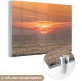 MuchoWow® Glasschilderij 90x60 cm - Schilderij acrylglas - Zonsondergang in de zee - Foto op glas - Schilderijen