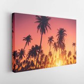 Canvas schilderij - Summer vacation and nature travel adventure concept. Tropical palm tree on sunset sky and clouds abstract background. Vintage tone filter effect color style.  -