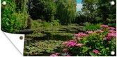 Affiche de clôture Jour d'été avec des nénuphars dans l'eau dans le jardin de Monet en France - 200x100 cm - Toile de jardin