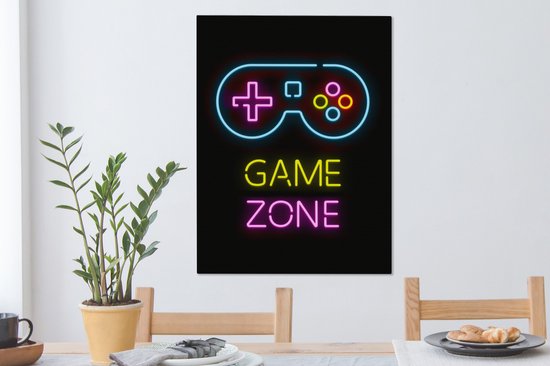 Toile noire avec néons : manette bleue, texte jaune 'GAME', texte rose 'ZONE'.