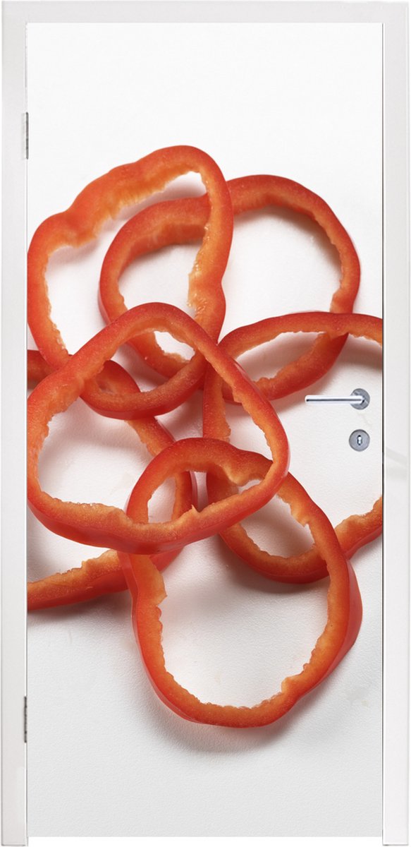 Afbeelding van product StickerSnake  Deursticker Gesneden rode paprika op elkaar - 95x215 cm - Deurposter