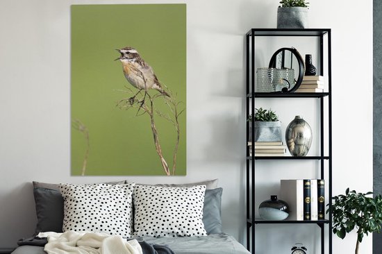 Tableau sur toile Un Whinchat chante sur une brindille - 90x140 cm - Décoration murale