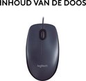 Souris Logitech M90 grise, vue de dessus. Texte : "CONTENU DE LA BOÎTE".