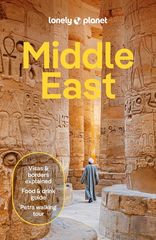 Lonely Planet Midden-Oosten reisgids met een man in traditionele kleding lopend tussen oude Egyptische pilaren.