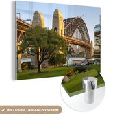 MuchoWow® Glasschilderij 30x20 cm - Schilderij acrylglas - Sydney Harbour Bridge in Australië in de middag - Foto op glas - Schilderijen