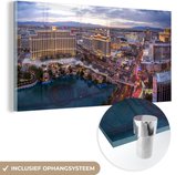 MuchoWow® Glasschilderij 160x80 cm - Schilderij acrylglas - Centrum - Las Vegas - Avond - Foto op glas - Schilderijen