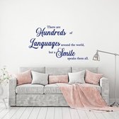 Muursticker There Are Hundreds Of Languages Around The World But A Smile -  Donkerblauw -  120 x 70 cm  -  alle muurstickers  woonkamer  engelse teksten - Muursticker4Sale