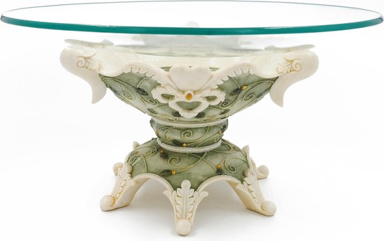 Decoratieve voet met groen en wit ornament. Glazen blad met groene rand.