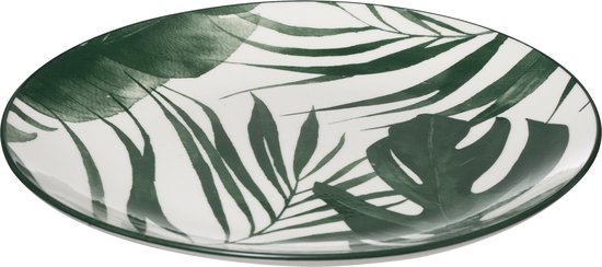 Plat blanc avec des feuilles de palmier tropicales et un bord noir.