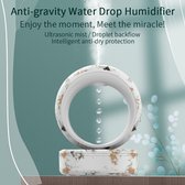 humidificateur anti-gravité - humidificateur avec des gouttelettes d'eau qui semblent couler vers le haut