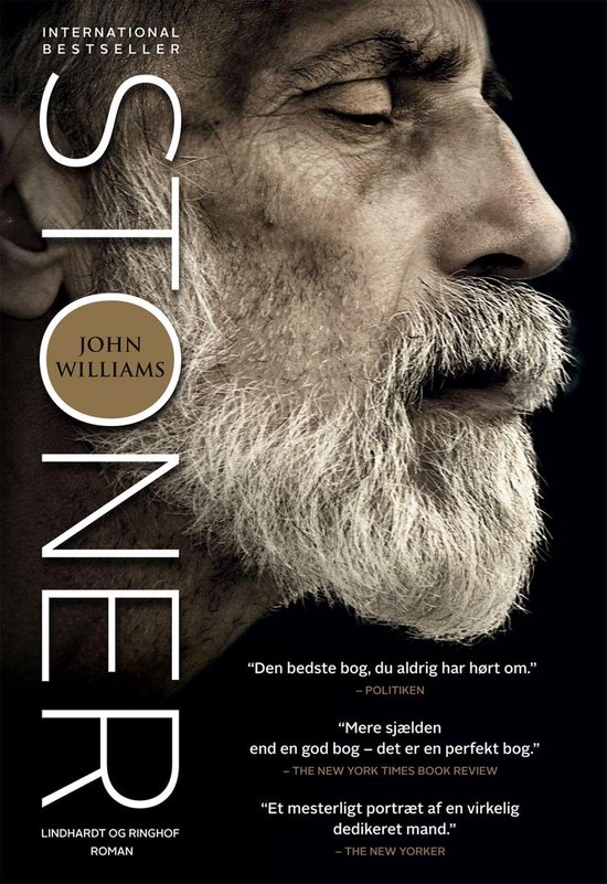 Boekomslag van "Stoner" door John Williams, met een close-up van een oudere man met grijs baardhaar.