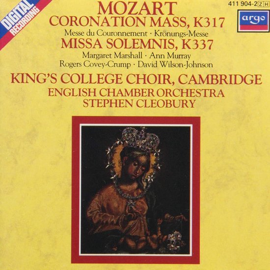 Cd-hoes met gele achtergrond, tekst van Mozart's Coronation Mass, K317 en Missa Solemnis, K337, en een afbeelding van een gekroonde figuur.