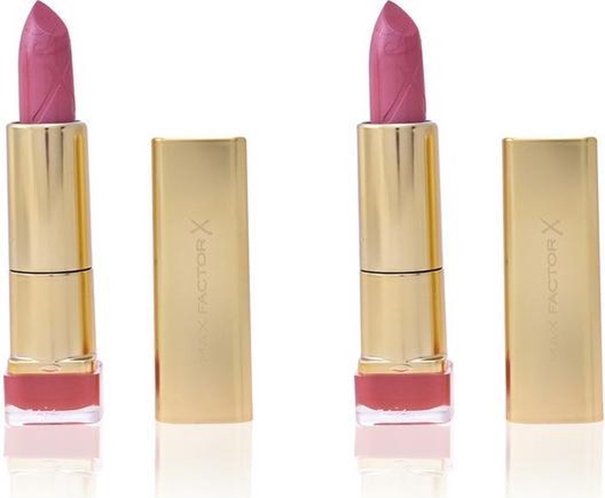 Paarse lipstick met gouden huls. De lipstick heeft een textuur en het logo 'MAX FACTOR X' op de huls.