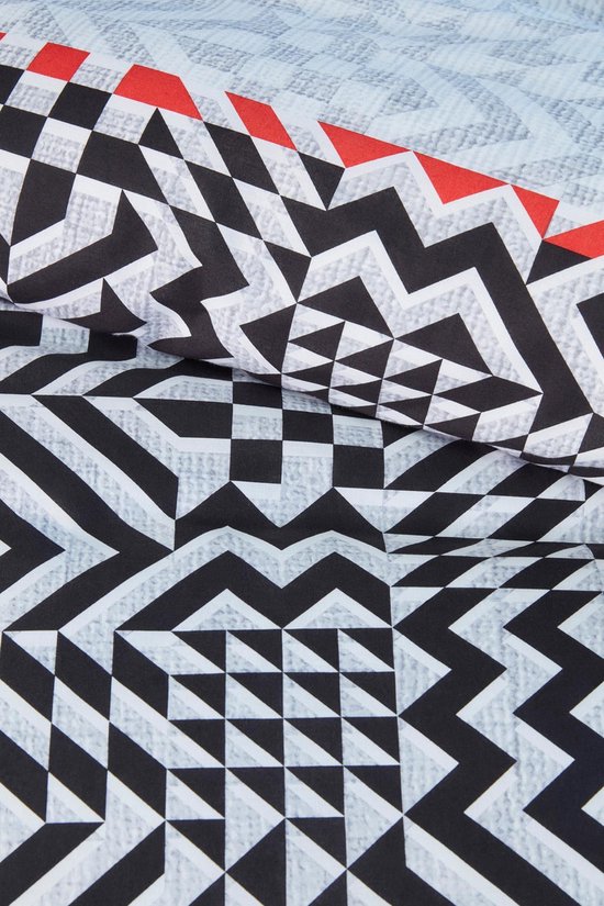 Motif détaillé de formes géométriques noires, blanches et grises avec des accents rouges.