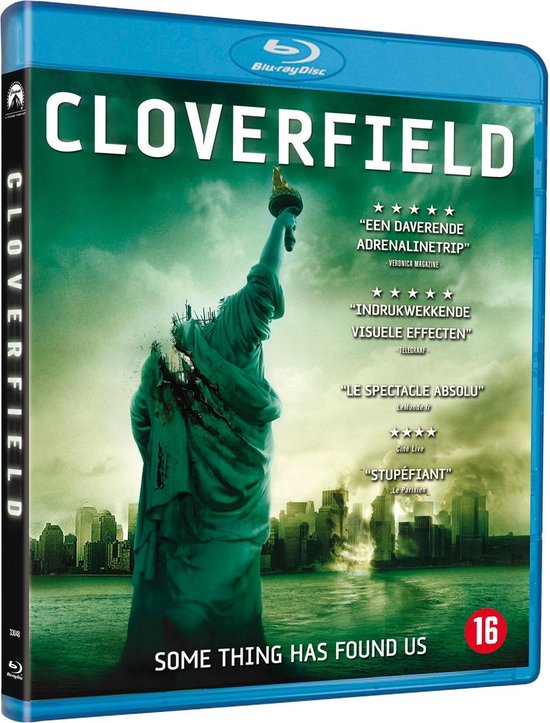 Cloverfield Blu-ray hoes met de Statue of Liberty, met groen verlichte stad op de achtergrond.