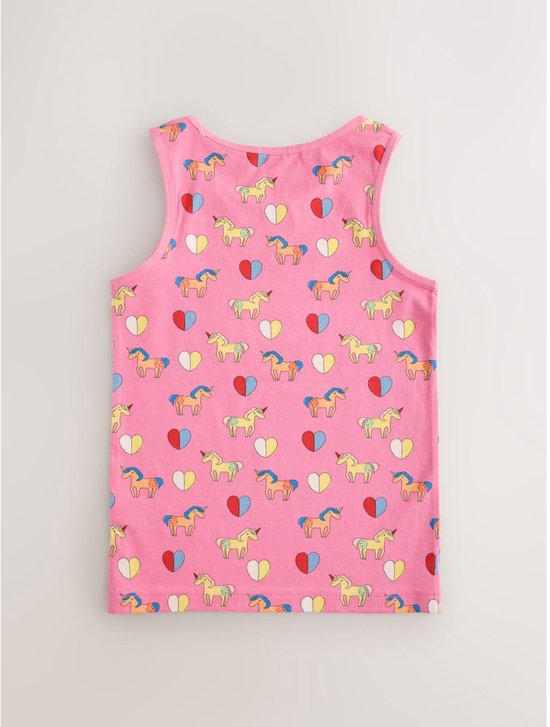 Roze hemdje met een all-over print van eenhoorns en hartjes.