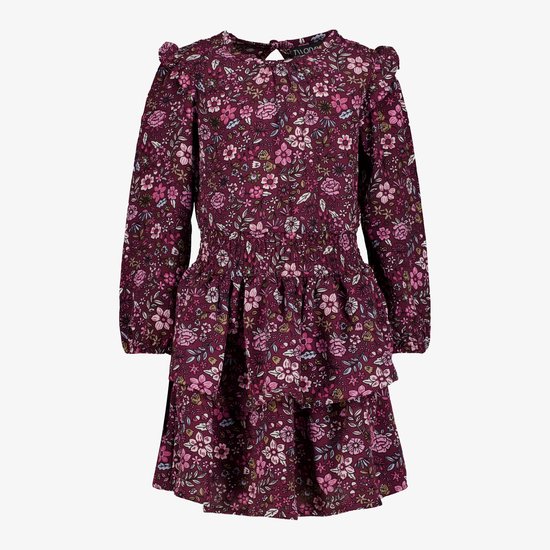 Paarse jurk met lange mouwen, ruches op de schouders, smocktaille en een veelkleurige bloemenprint.