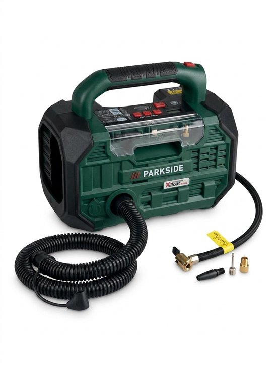 Parkside accu compressor, groen en zwart, met slang en verschillende nozzles.