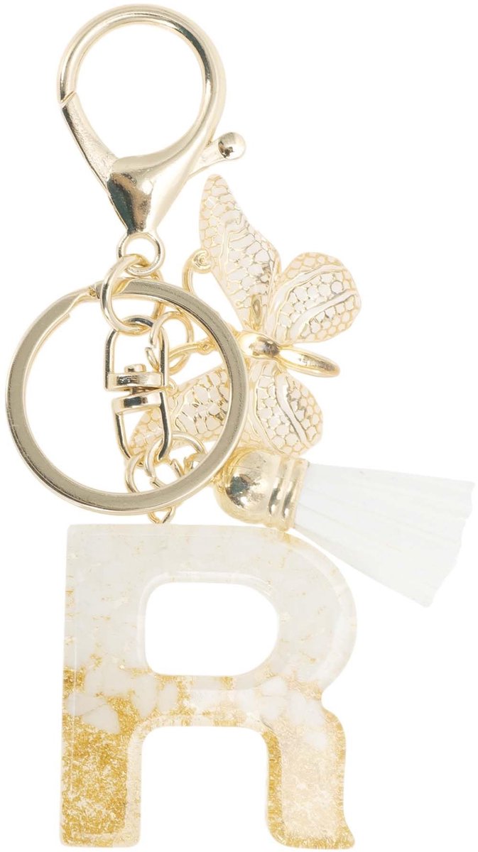 Dailygoods- Sleutelhanger met Kwastje - Sleutelhanger voor Meisjes - Hanger met Letter R - Cadeau voor Dames - Duurzaam Harsmateriaal - Totale Lengte 9,3 cm