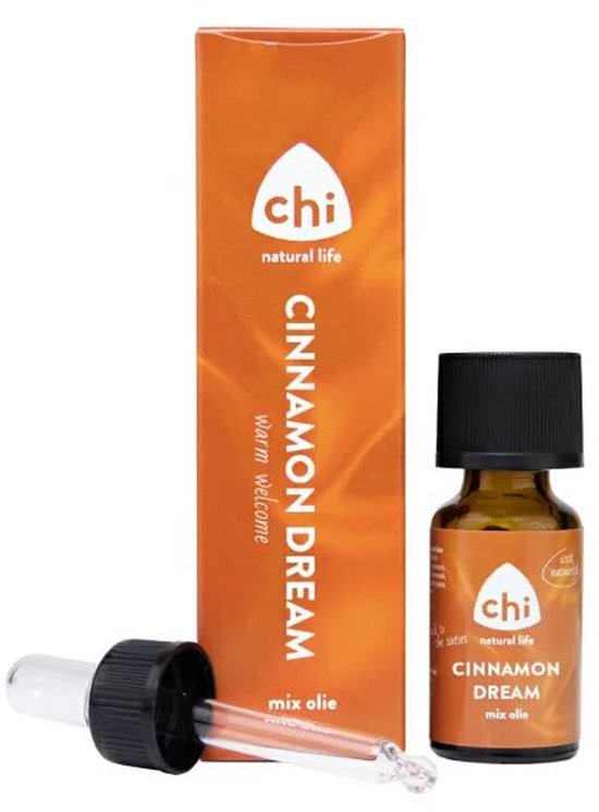 Een oranje doosje met de tekst CINNAMON DREAM warm welcome mix olie en een flesje bruin glas met pipet.
