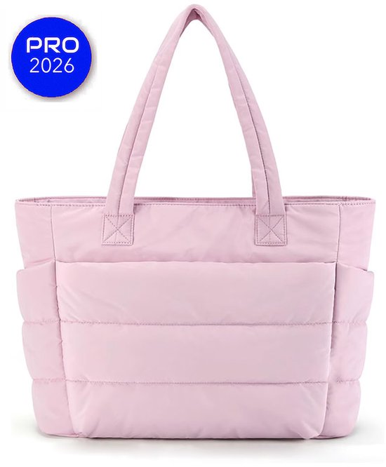 Tote bag matelassé rose avec anses et poches latérales, isolé sur fond blanc.